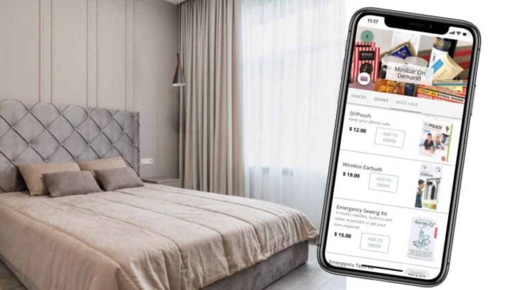 a bed and a phone showing Hotel Minibar Apps